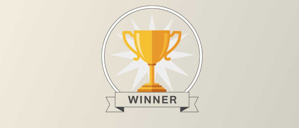 Illustration eines goldenen Siegerpokals in einem Kreis mit dem Schriftzug WINNER auf einem Banner davor.